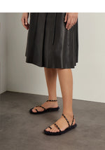 Eleftheria Shearling Black/Gold Studs sandals